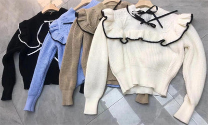 Pull en tricot femme avec col à volants et nœuds décoratifs Chic und Stil