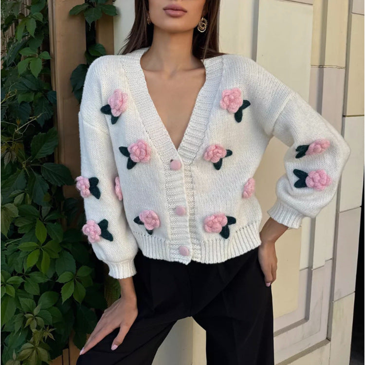 Dame cardigan avec design floral brodé et bord côtelé Chic und Stil