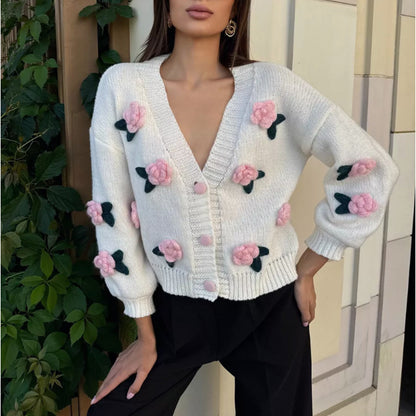 Dame cardigan avec design floral brodé et bord côtelé Chic und Stil