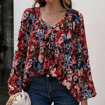 Blouse femme avec des motifs floraux et des manches légères Chic und Stil