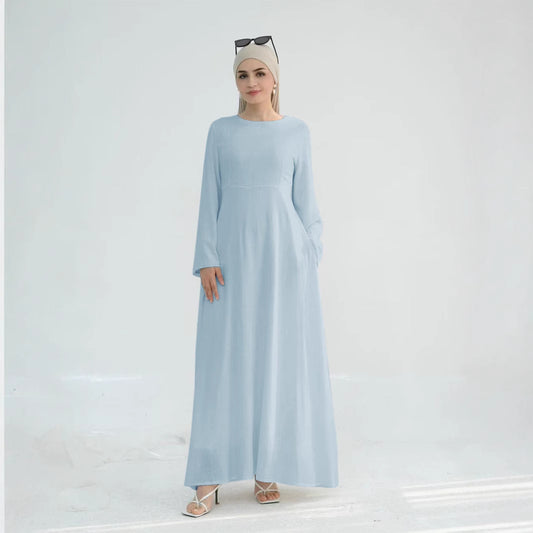 Robe maxi élégante pour dames avec des manches longues et des poches latérales Chic und Stil