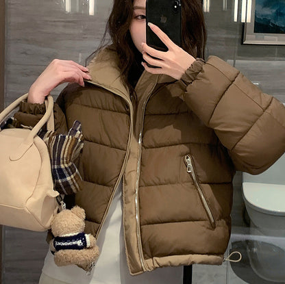 Dames courte veste de loisirs matelassée avec poches zippées latérales Chic und Stil