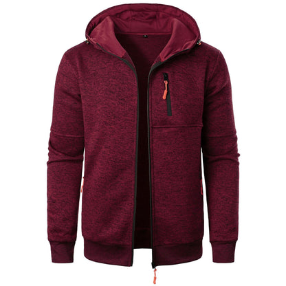 Veste à capuche sportive pour hommes avec un design structurel innovant et des poches pratiques Chic und Stil
