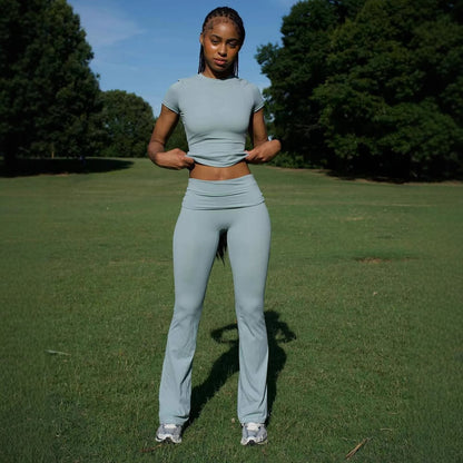 Chic and Style ladies' sporty outfit with fitted top and flared pants