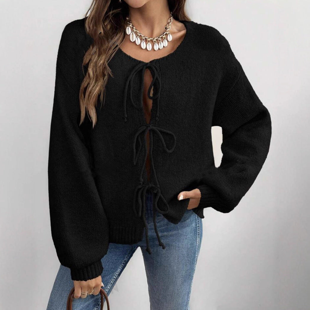 Pull en maille pour femmes avec un design de laçage décoratif et des manches ballon décontractées Chic und Stil
