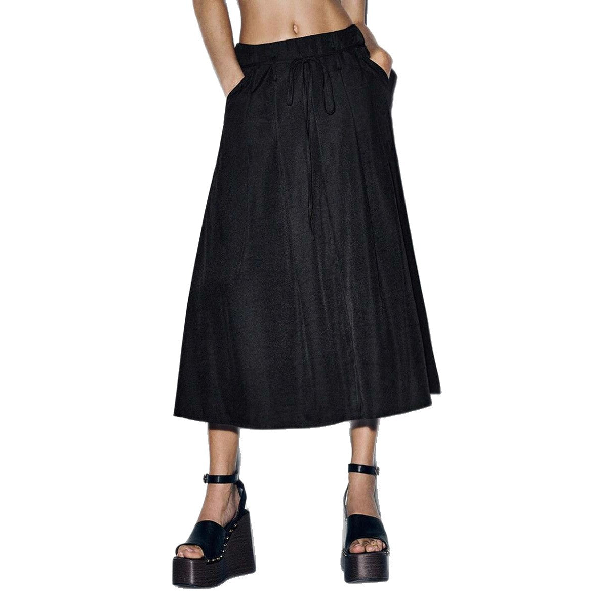 Loose jersey pants for women with a tie belt and practical pockets Chic and Style