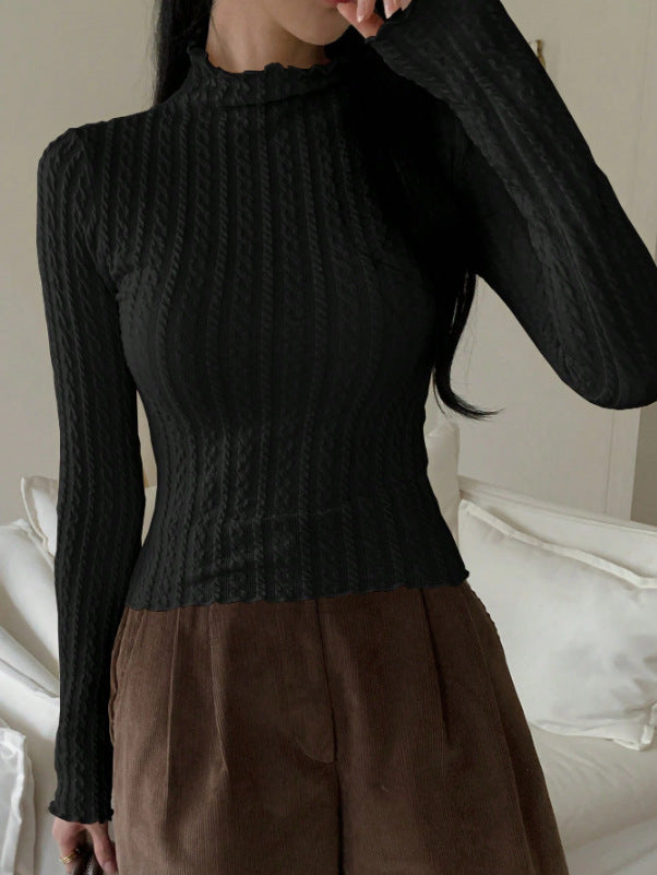 Dames haut à manches longues avec design texturé Chic und Stil