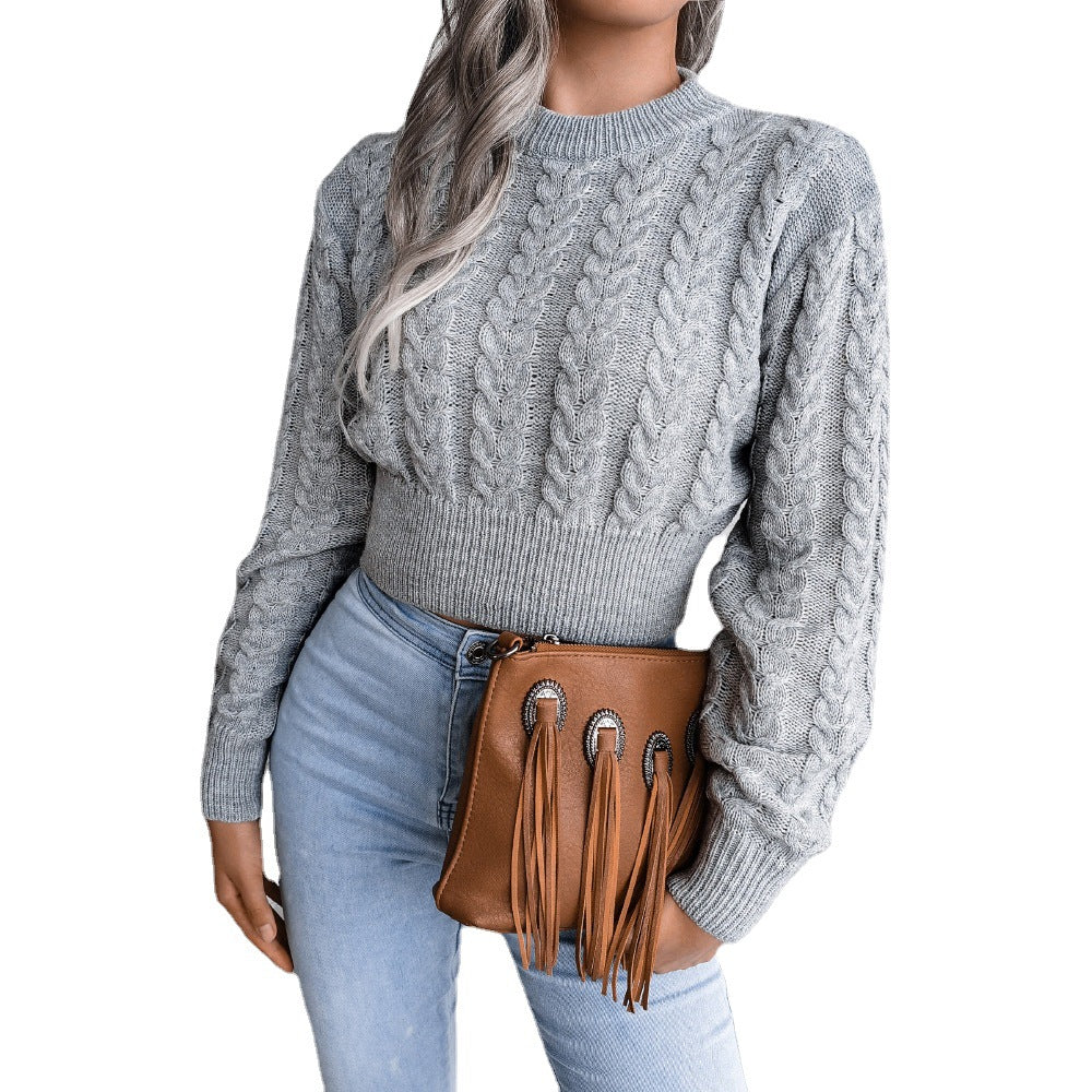 Pull en maille épaisse pour femmes avec ourlet allongé et appliques en cuir synthétique Chic und Stil