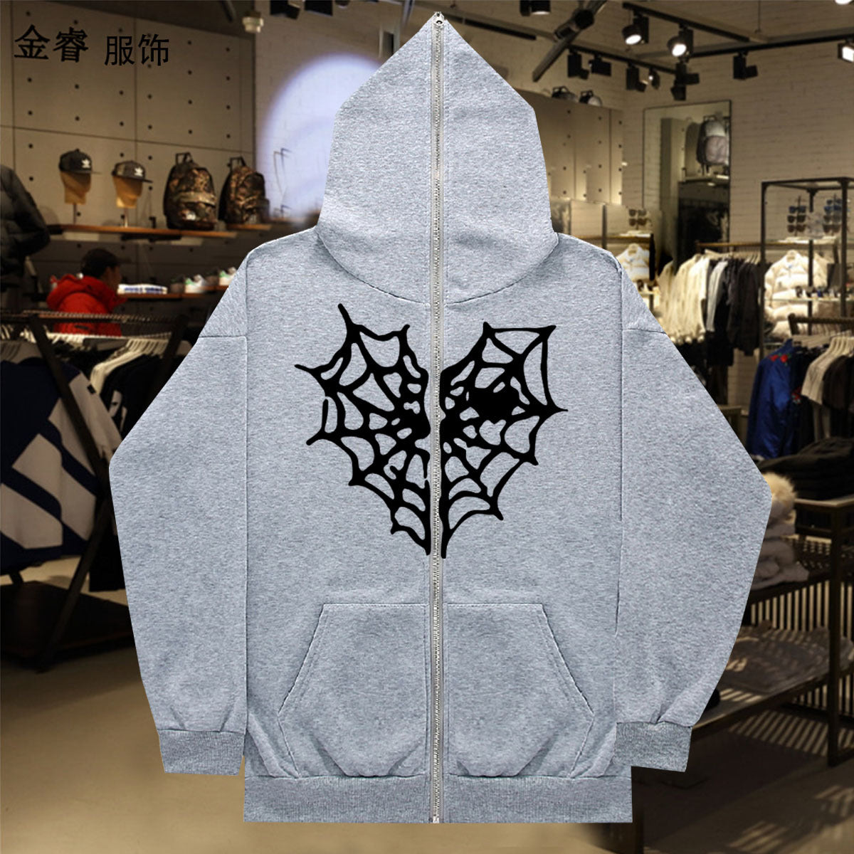 Dame Hoodie avec un design de toile d'araignée saisissant Chic und Stil