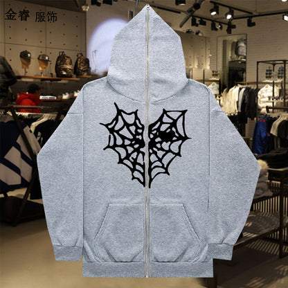 Dame Hoodie avec un design de toile d'araignée saisissant Chic und Stil