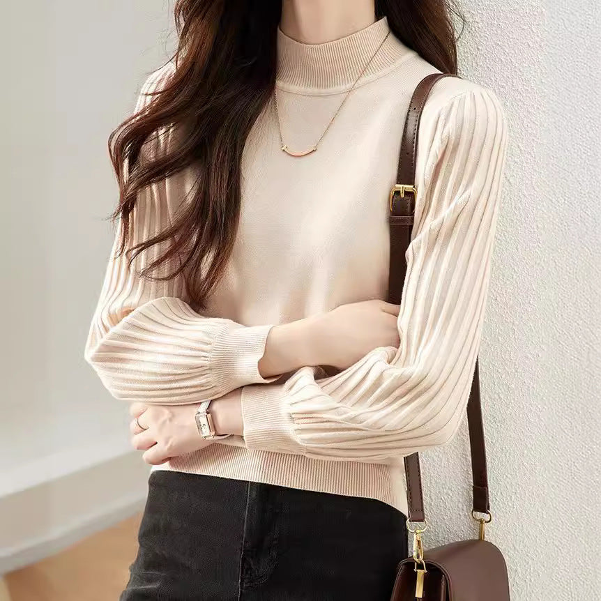 Pull élégant pour femmes avec des manches tricotées hautes Chic und Stil
