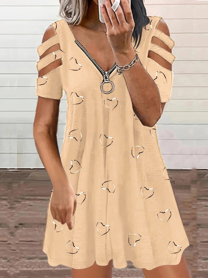 Robe de loisirs pour dames avec des manches à découpe et un motif en forme de cœur Chic und Stil