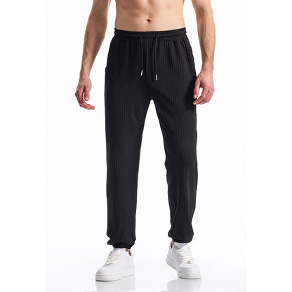 Comfortable sports pants for men with elastic waistband and chic striped design