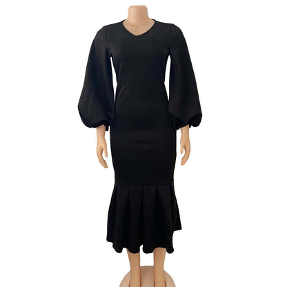 Robe ajustée pour femmes avec des manches volumineuses et un ourlet flottant Chic und Stil