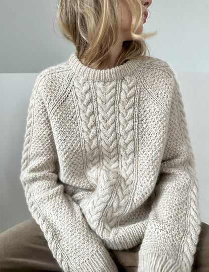 Pull en tricot pour femmes avec un design de torsades élaboré Chic und Stil