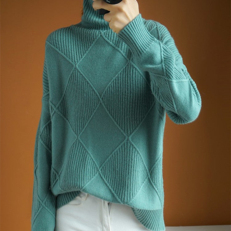 Pull femme à col montant tendance avec une optique structurée Chic und Stil