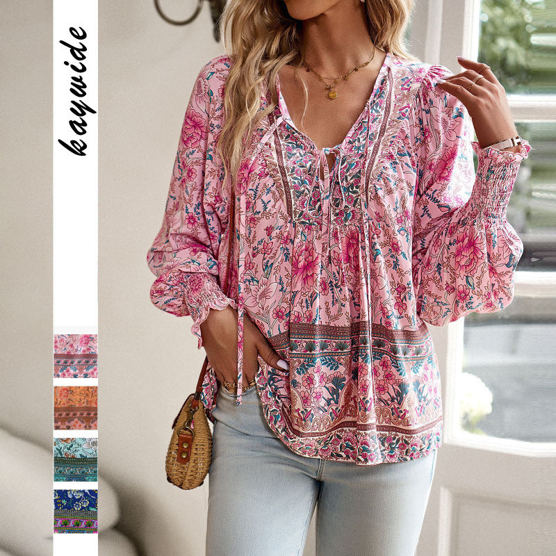 Blouse féminine légère avec motif floral et lacets détaillés Chic und Stil