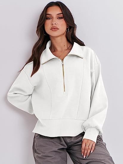 Pull sportif pour femmes avec col montant et demi-zip Chic und Stil