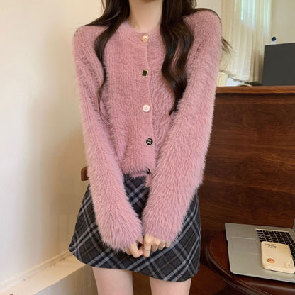 Dames cardigan doux avec boutons et texture en fausse fourrure Chic und Stil