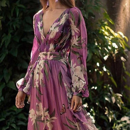 Robe maxi femme avec décolleté en V profond, design floral et jupe fluide Chic und Stil