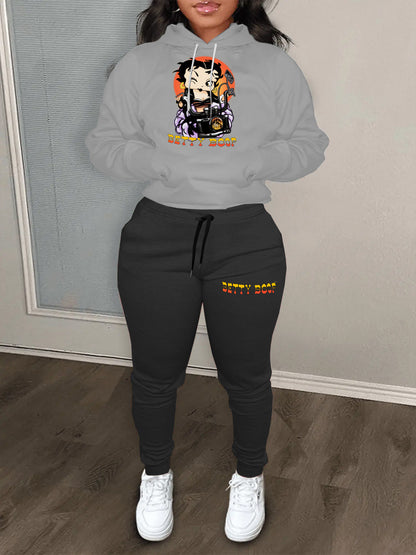 Women's sporty hoodie and jogger pants set with a unique graphic design Chic and Style
