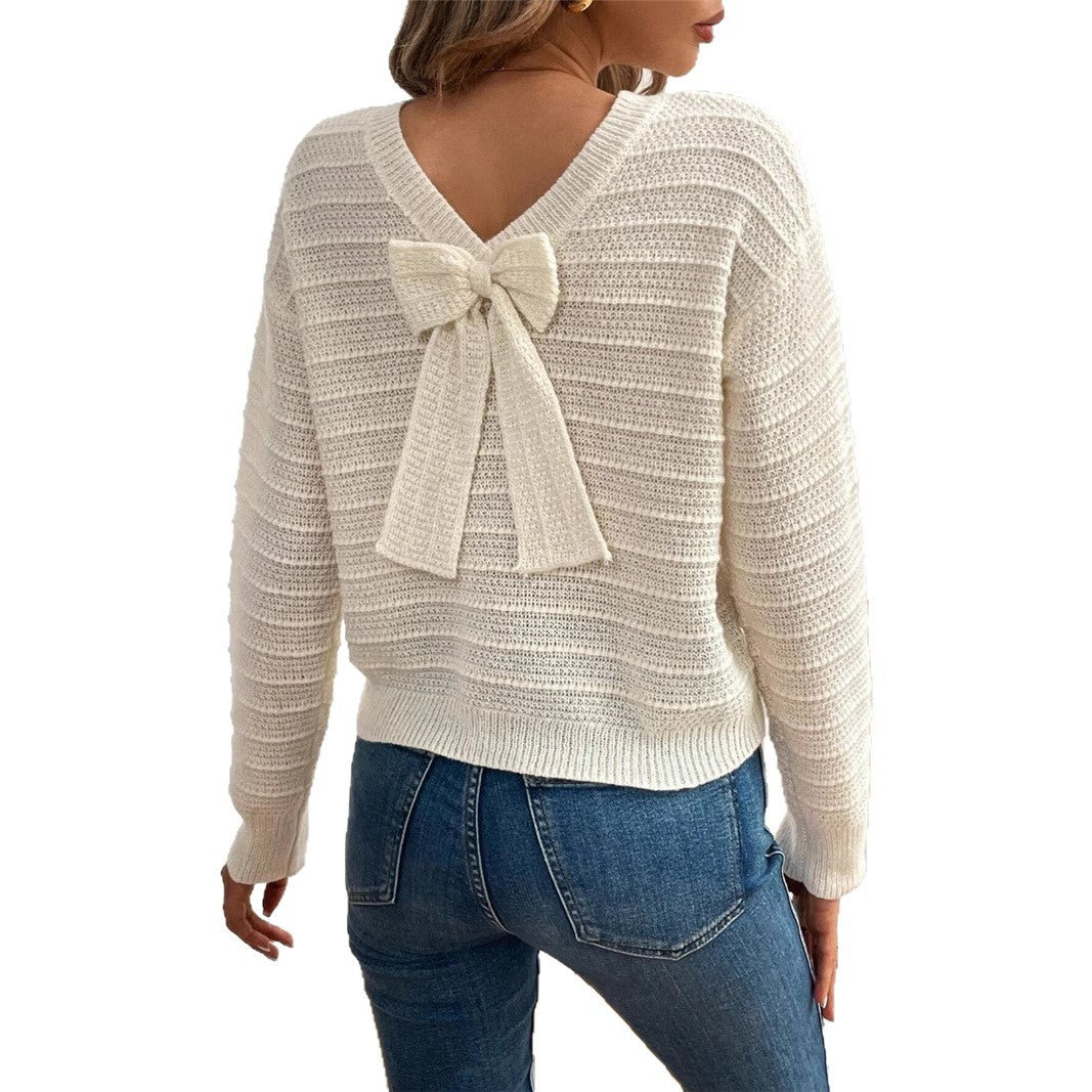 Pull femme en tricot à col en V avec élément décoratif de nœud Chic und Stil