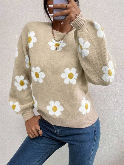Pull en tricot pour femmes avec un motif floral ludique et des manches bouffantes élégantes Chic und Stil
