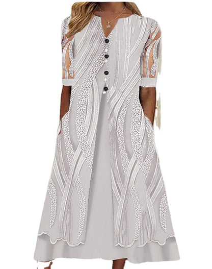 Robe à manches longues pour femmes avec des détails artistiques et fermeture à boutons Chic und Stil