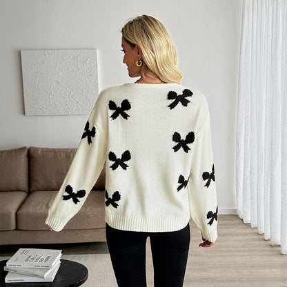 Pull femme avec motif de nœuds et coupe confortable Chic und Stil