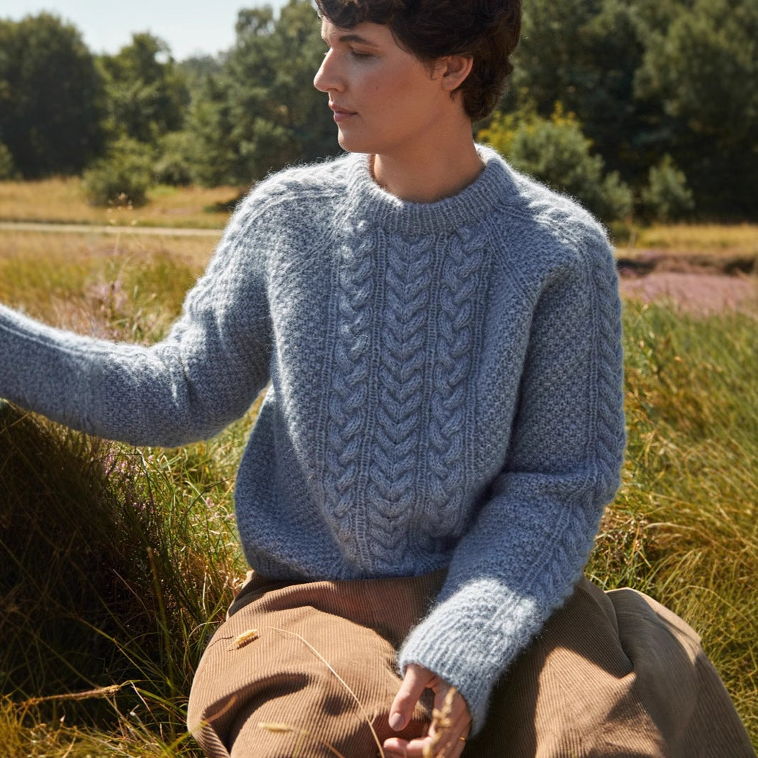 Pull en tricot pour femmes avec un design de torsades élaboré Chic und Stil