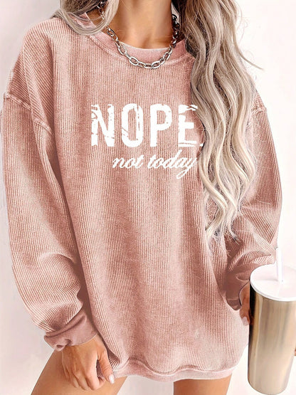 Pull oversized décontracté pour femmes avec impression statement et texture côtelée Chic und Stil