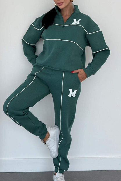 Costume de lounge sportif pour femmes avec col haut et taille élastique Chic und Stil