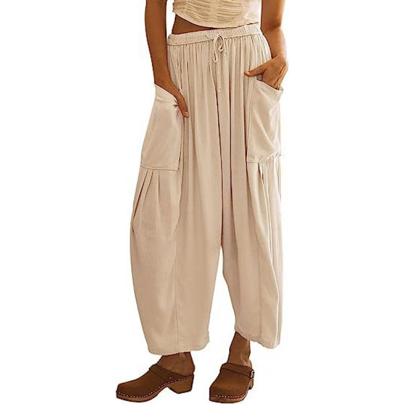Casual harem pants for women with practical side pockets and loose fit Chic and Style