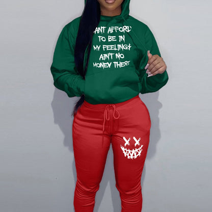 Casual women’s outfit with hoodie and jogger pants, featuring unique writing and creative patterns Chic and Style