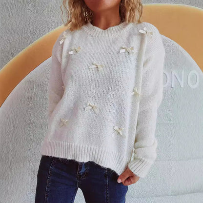 Pull en tricot pour femmes avec des accents de nœuds ludiques Chic und Stil