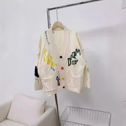 Dames Grand gilet en tricot avec broderies colorées Chic und Stil