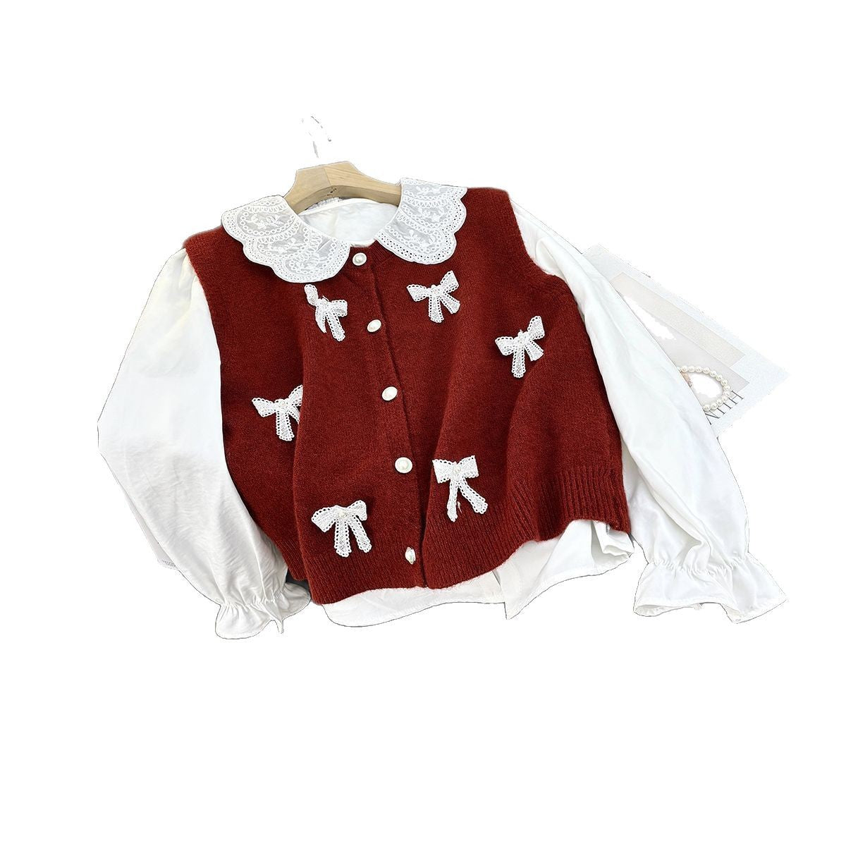 Dames cardigan en tricot ludique avec col enroulé et nœuds décoratifs Chic und Stil