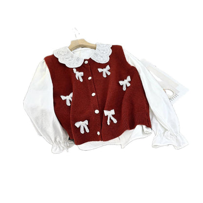 Dames cardigan en tricot ludique avec col enroulé et nœuds décoratifs Chic und Stil