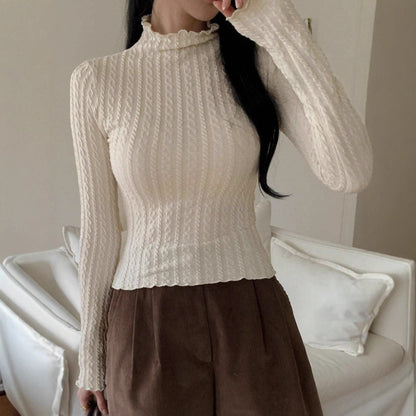 Dames haut à manches longues avec design texturé Chic und Stil