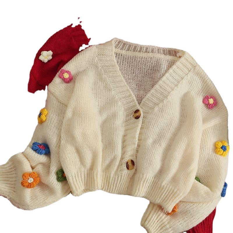 Dames gilet en tricot douillet avec des appliqués floraux ludiques Chic und Stil