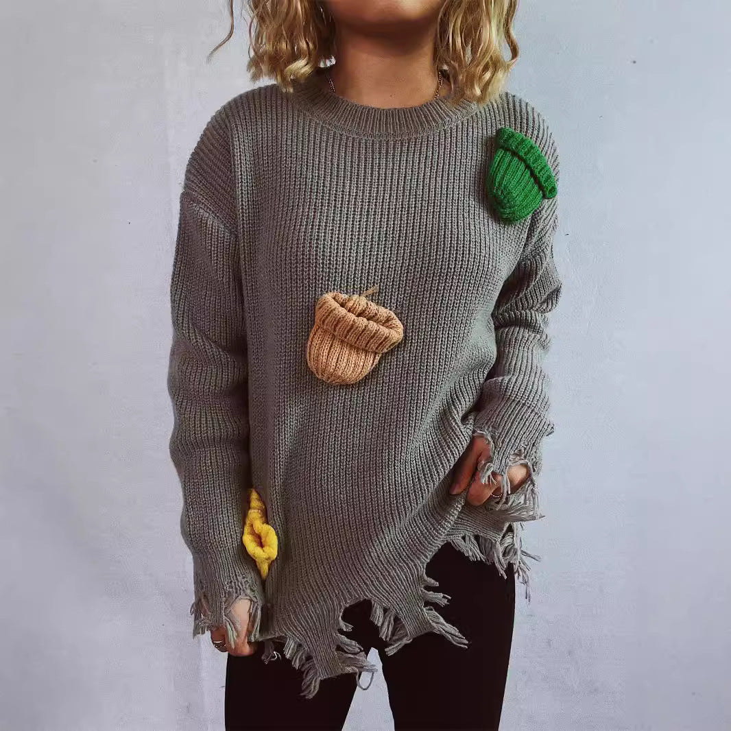 Pull over-sized décontracté pour femmes avec des détails frangés et des appliques colorées Chic und Stil