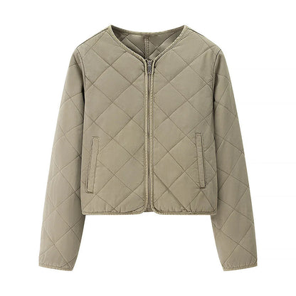 Quilted transition jacket for women with practical pockets and stylish stand-up collar Chic and Style