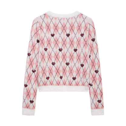 Pull femme avec motif en forme de cœur et éléments scintillants Chic und Stil