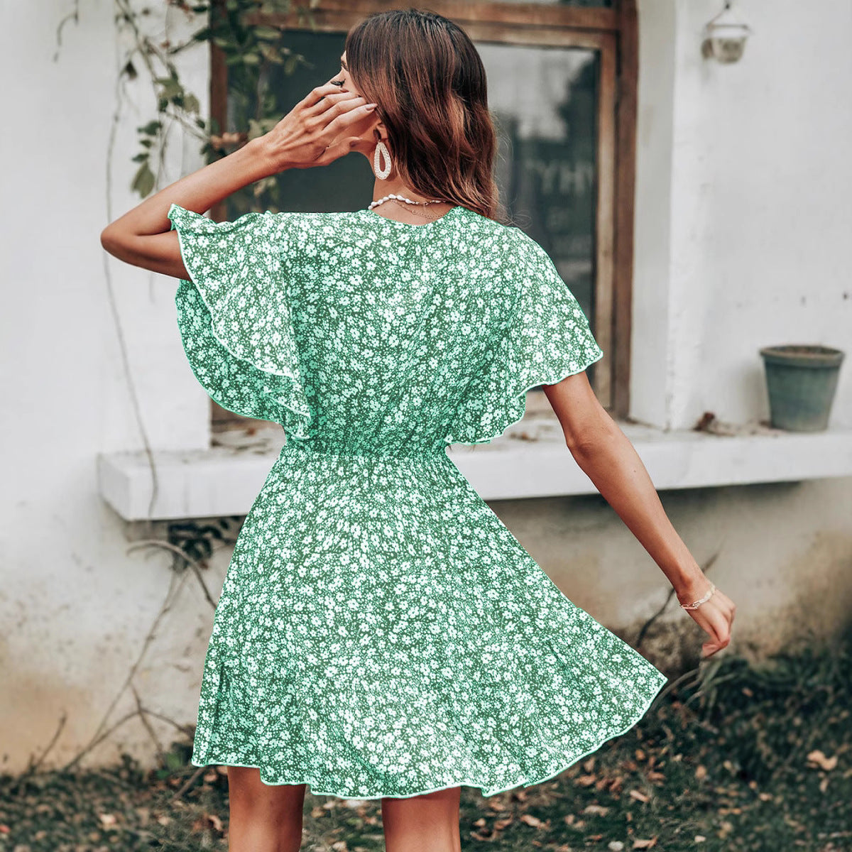 Dames Robe Twirl à manches flottantes fleuries Chic und Stil