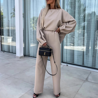 Elegant and modern women's two-piece set with a loose top and chic palazzo pants.