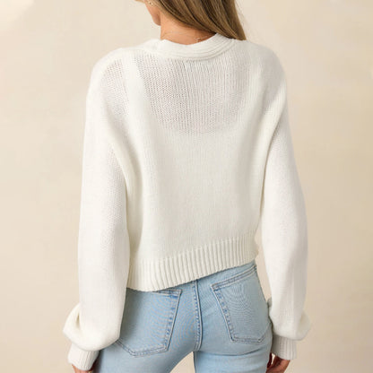 Veste en tricot pour femmes avec des appliqués floraux et des détails de bouton confortables Chic und Stil