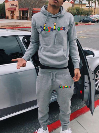 Ladies Hooded Sweatshirt and Jogging Pants Set with Creative Graphic Design Chic and Style