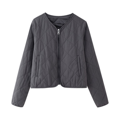 Ladies quilted transition jacket with trendy zip closure and comfortable pockets Chic and Style