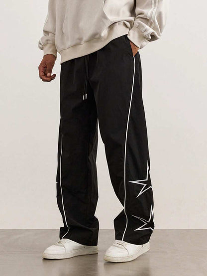 Pantalons de loisirs pour hommes avec bandes de contraste latérales Chic und Stil