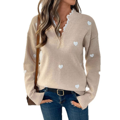 Pull femme à appliqués en forme de cœur Chic und Stil